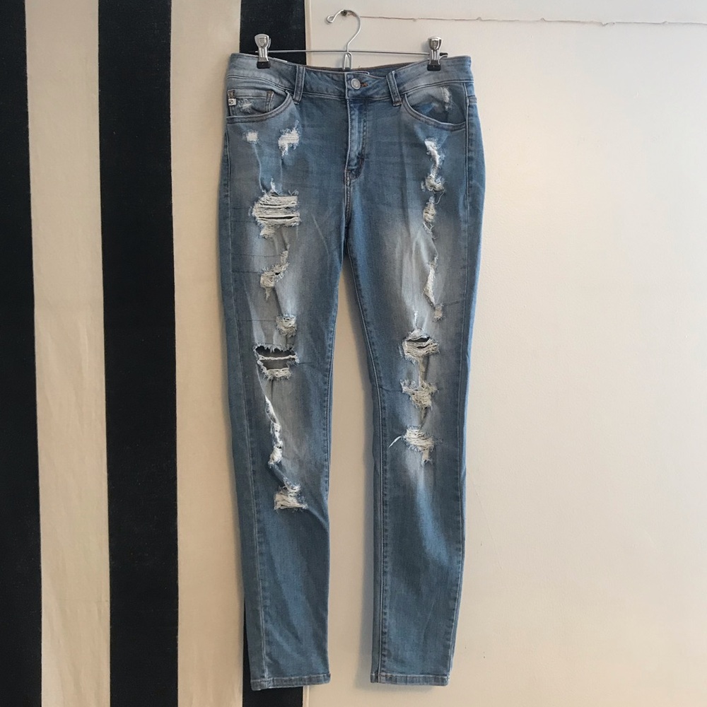 Stretchy distressed light wash skinny jeans